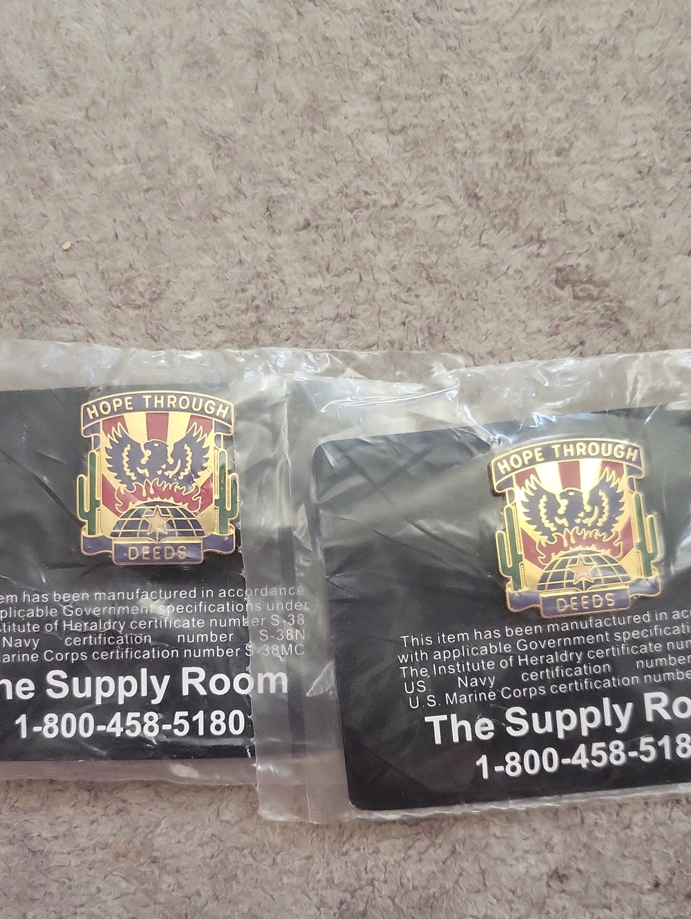 Hope Through Deeds Military Patch - Black Background with Gold & Red Emblem